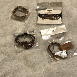 4 new in packaging bracelets